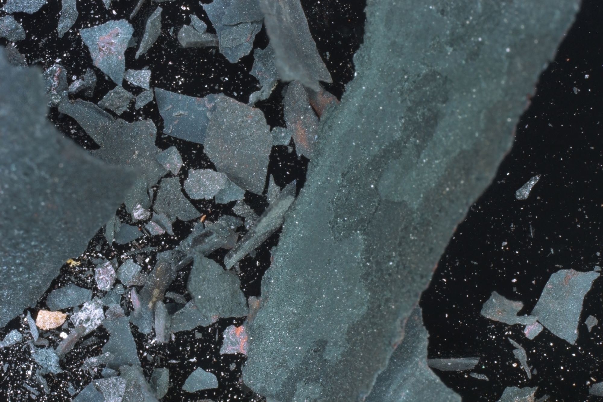 Image: Fractals, word dust, microscopic images of steel slag on carbon tape, dimensions variable.